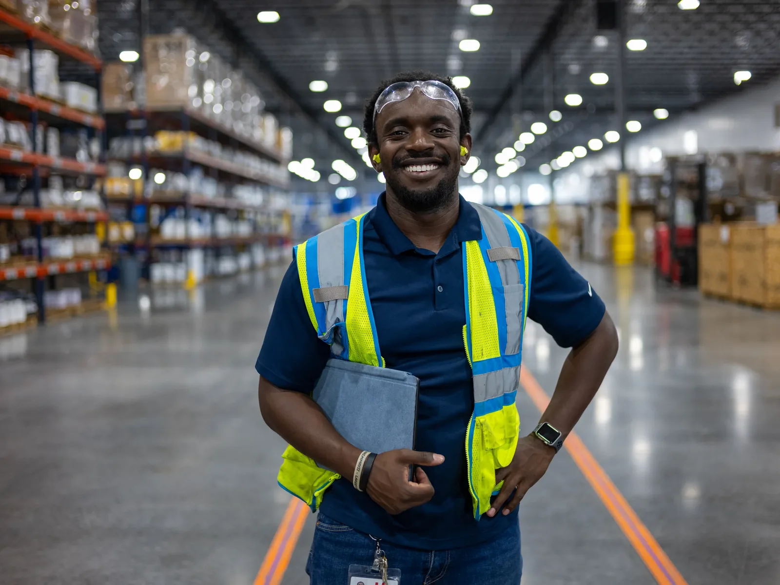 IXS Coatings team member on the warehouse floor