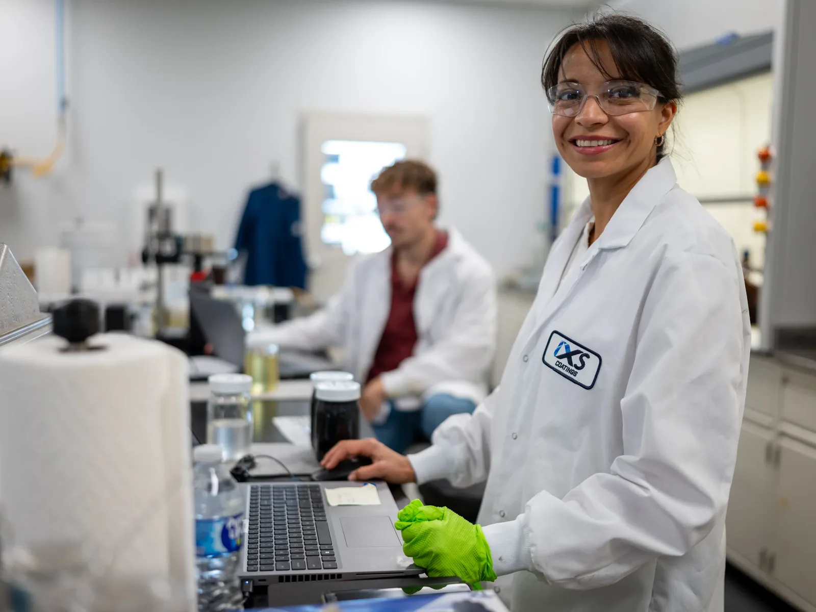 IXS Coatings lab technicians at work in the ISO 17025-accredited laboratory